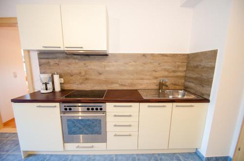 keuken, Panorama Apartments Bruck by All in One Apartments in Bruck An Der Glocknerstrasse