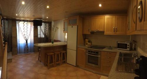 ห้องครัว, Alojamento Pelourinho in กูเวีย