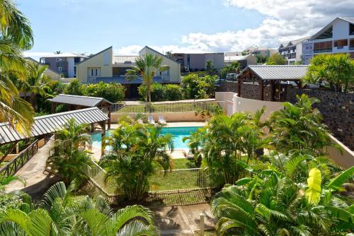 . Appartement TY KAZ DODO, classé 3 étoiles, vue mer, piscine résidentielle, Mont Roquefeuil, Saint-Gilles-Les-Bains, 6 personnes