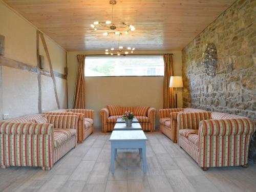 Grand Holiday Home in Érezée with Sauna gîte à louer Amonines