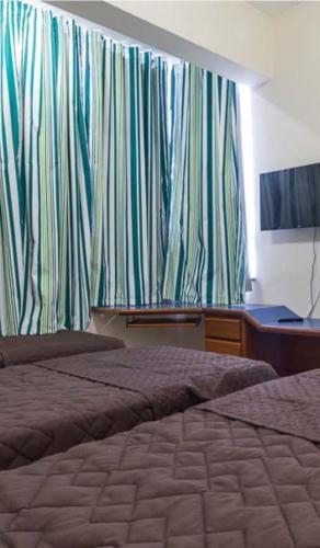 BH EXPO SUITES & KITNETES – Belo Horizonte, GA