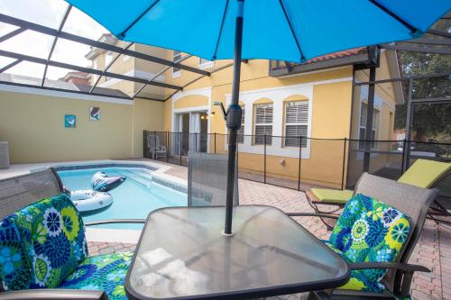 Four Bedroom w/ Pool Close to Disney 8570 - image 3