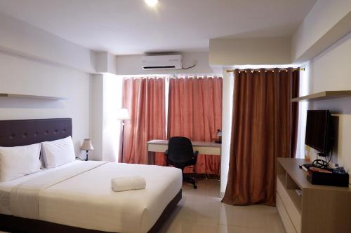 Best Price Studio Apartment The H Residence near MT Haryono By Travelio