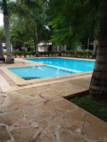 สระว่ายน้ำ, Royal Palms Apartment A4 in อึมทวาปา