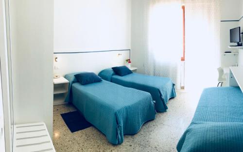 Camera tripla, 3 letti