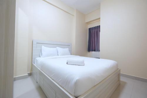 New Furnished 2BR The Nest Apartment near Puri Indah Mall and Lippo Puri By Travelio