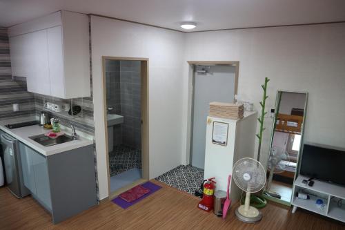 Blue Island Guesthouse Blue Island Guesthouse is perfectly located for both business and leisure guests in Jeju Island. The property has everything you need for a comfortable stay. Service-minded staff will welcome and guid