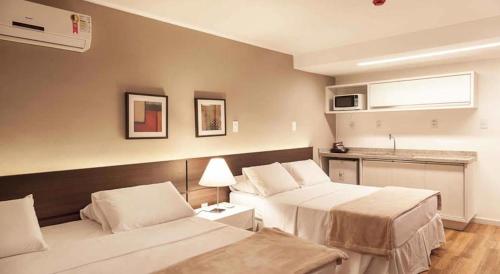 Atmosfera Hotel Atmosfera Hotel is perfectly located for both business and leisure guests in Feira De Santana. Featuring a complete list of amenities, guests will find their stay at the property a comfortable one. Se