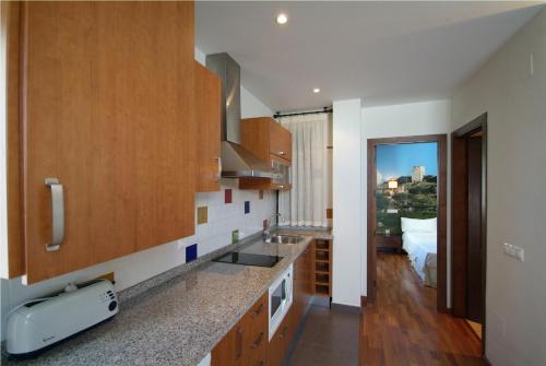 Kitchen, Apartamentos Ardales in Ardales
