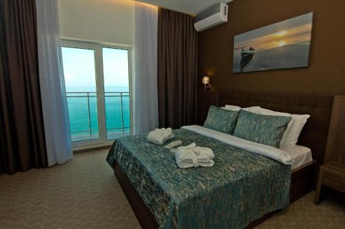 Sky Inn Hotel Batumi Room Type - Deluxe Suite with Sea View Sky Inn Hotel Batumi Room Type - Deluxe Suite with Sea View