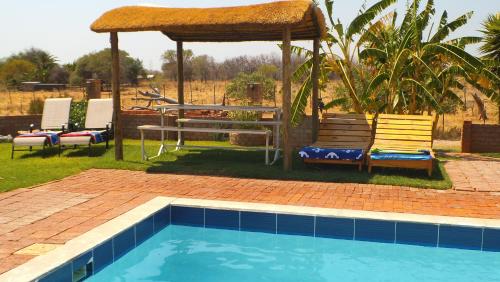 Swimming pool, Pondoki Rest Camp in Grootfontein