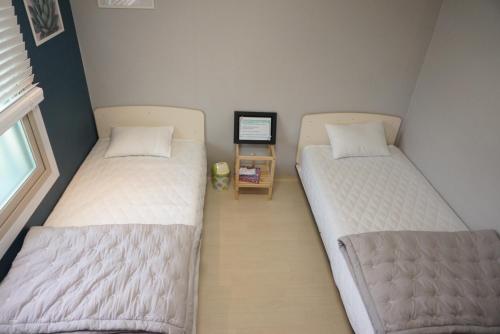 AIRPORT Guesthouse Room Type - Standard Twin Room