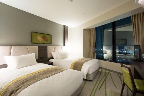 Executive Twin Room ( 33th - 35th Floor) - Late Check In (17:00~) - Check Out (~10:00)