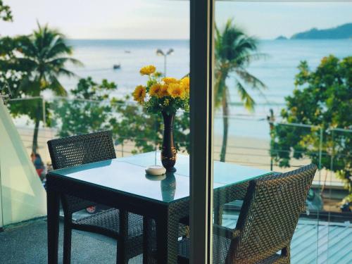 Beachfront 2-bedroom condo with panoramic seaview Beachfront 2-bedroom condo with panoramic seaview