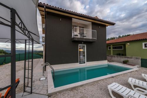 Villa Art house with Pool and a beautiful view on the river Mirna valley - image 11