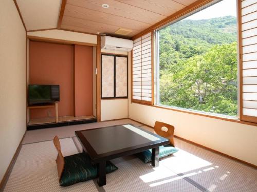 Japanese Style Economy Twin Room with Shared Bathroom - Non-Smoking