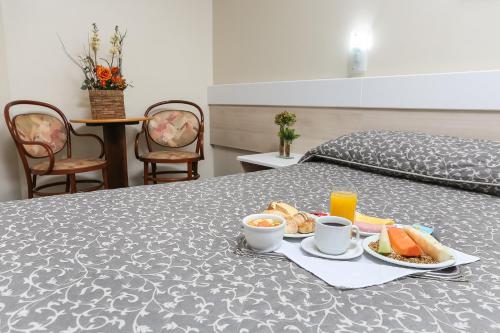 Hotel Express Centro Historico Located in Porto Alegre City Center, Hotel Express Centro Histórico is a perfect starting point from which to explore Porto Alegre. The property features a wide range of facilities to make your stay 