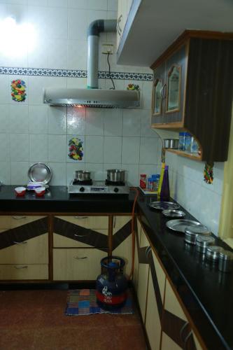 مطبخ, Coimbatore Home Stay & Serviced Apartment in سارافانامباتي