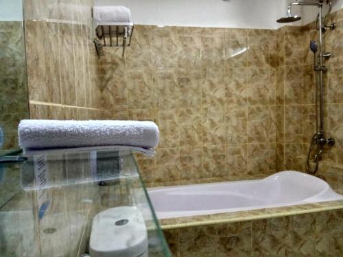 C-Breez Resort Bitung C-Breez Resort Bitung is conveniently located in the popular Bitung area. The property has everything you need for a comfortable stay. To be found at the property are free Wi-Fi in all rooms, private 