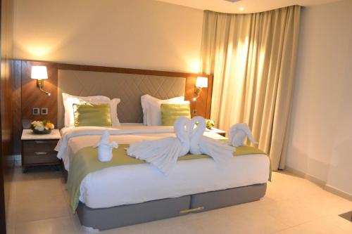 Bed, Ramee Palace Hotel in Manama