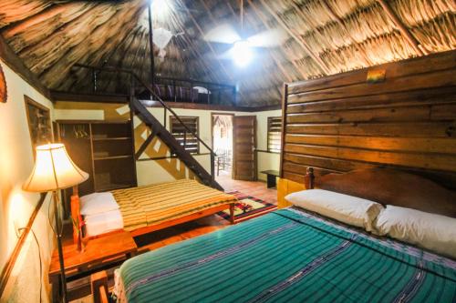 Cohune Palms River Cabanas in Sanignasio