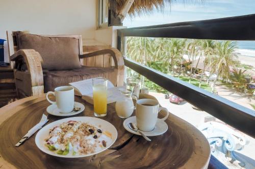 Bungalows Zicatela Set in a prime location of Puerto Escondido, Bungalows Zicatela puts everything the city has to offer just outside your doorstep. The hotel offers a wide range of amenities and perks to ensure you hav