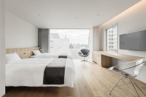 Hotel Comfact Room Type - Deluxe Twin Room