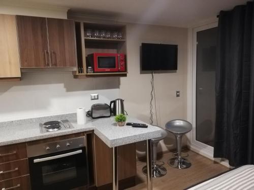 Depto Estudio 1811 Edificio Centro Blanco con estacionamiento in 特木科