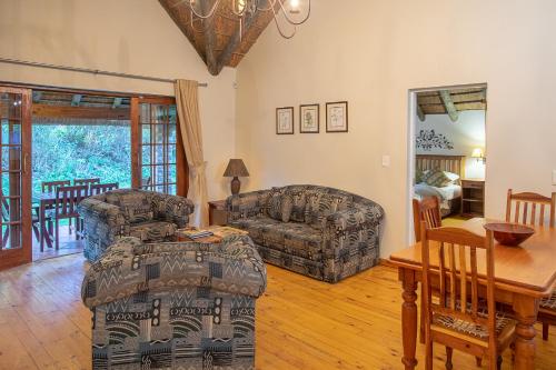Coral Tree Cottages - Tap to explore photos
