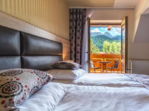 Premium Double Room with Balcony and Mountain View (3 Adults)