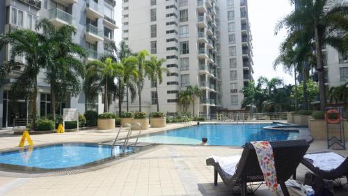 Palm Tree Condos across NAIA3 by Beth Palm Tree Condos across NAIA3 by Beth