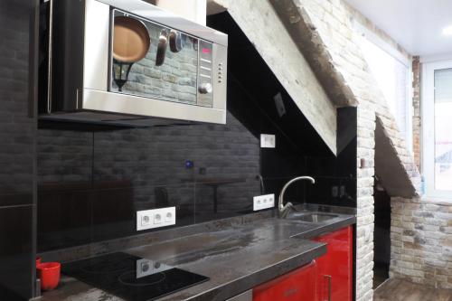 Tiny apartment on the roof touching Gibraltar in ลาลิเนียเดลาคอนเซพเซียน