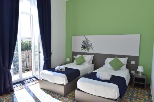 Specchio di Parthenope B&B Specchio di Parthenope is conveniently located in the popular Chiaia area. Offering a variety of facilities and services, the property provides all you need for a good nights sleep. Wi-Fi in public a