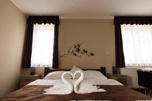 Cuha-gyöngye Apartmanház - image 8