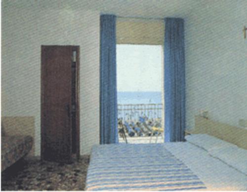 Family Room (2 Adults + 2 Children) with Balcony room in Hotel Playa e Mare Nostrum