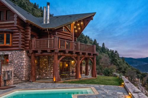 숙소 외관, Mythica Chalet in 아기오이 아나르기로이