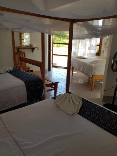 El Eden Bungalows - Tap to explore photos