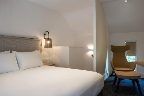 Hotel Ginkgo - SPA Biloba Ideally located in the Locmaria area, Hôtel Ginkgo promises a relaxing and wonderful visit. The property has everything you need for a comfortable stay. Shrine, daily housekeeping, 24-hour front desk