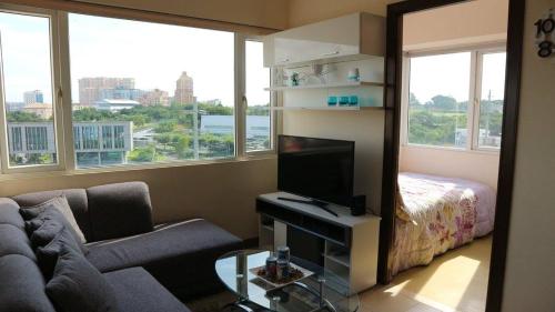 2 BR Condotel near Venice Grand Canal, SM Aura Mall and BGC