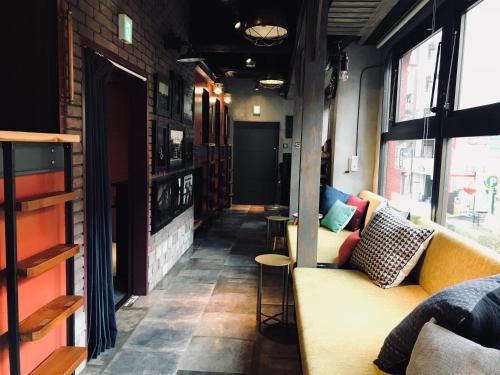 Shared lounge/TV area, HARE-TABI SAUNA & INN YOKOHAMA in Yokohama