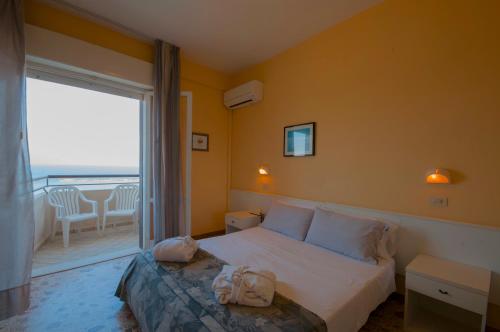 Camera quadrupla, vista sul mare