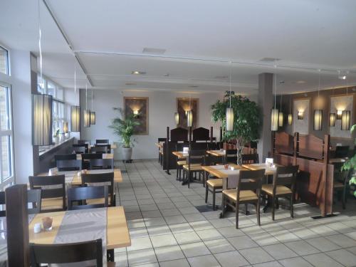 Restaurang, Hotel Pension Am Hafen in Norden