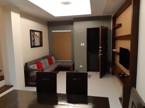 Guestroom, Restful 3BR Hillside Duplex House in Loakan