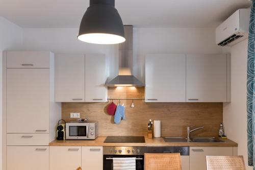 Kitchen, Design-Apartments Graz in Puntigam