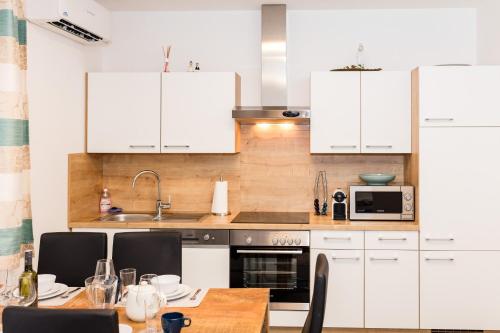 Kitchen, Design-Apartments Graz in Puntigam
