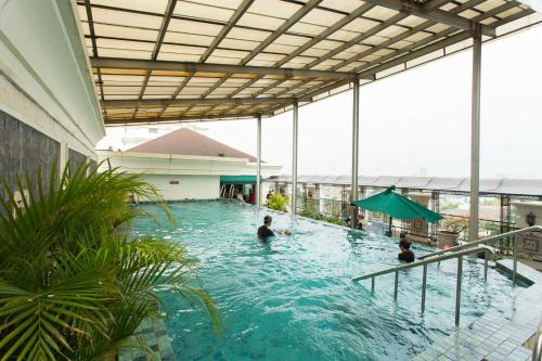 Foto - Roosseno Plaza Serviced Apartment