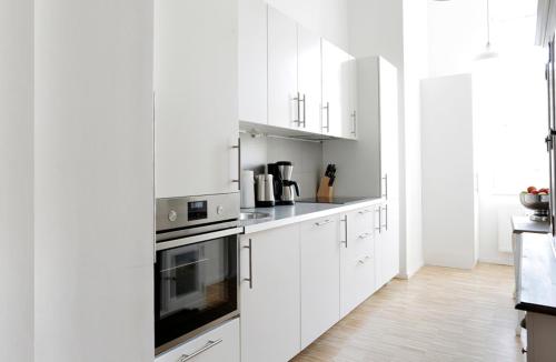 SC 04 by ROCKCHAIR Apartments l SUPERHOST Status l 4 Bedrooms Boxspringbeds 2 Bathrooms Balcony Elevator - Cozy Family & Business Flair welcomes you!, Berlino (foto 9)
