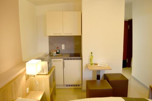 Kitchen, Hana Aparthotel in Other