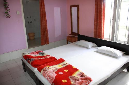 Sneha Bhawan Set in a prime location of Kaziranga, Sneha Bhawan puts everything the city has to offer just outside your doorstep. The property features a wide range of facilities to make your stay a pleasant exper