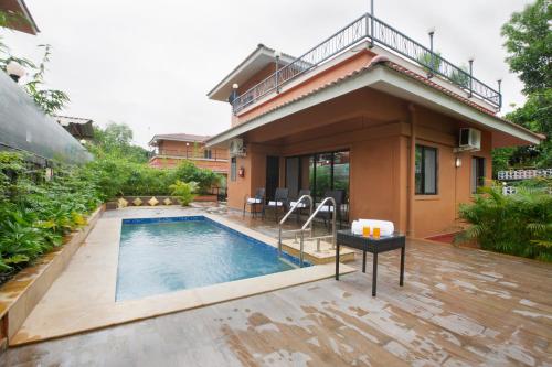 SaffronStays Dhyana - 3BR pet-friendly pool villa with Wi-Fi, indoor games and riverside trails in Wadas gated estate